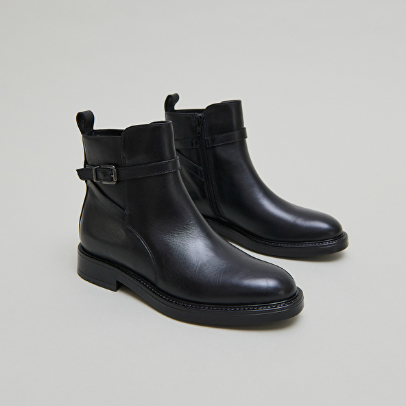 Boots à boucles in black leather | CLEA