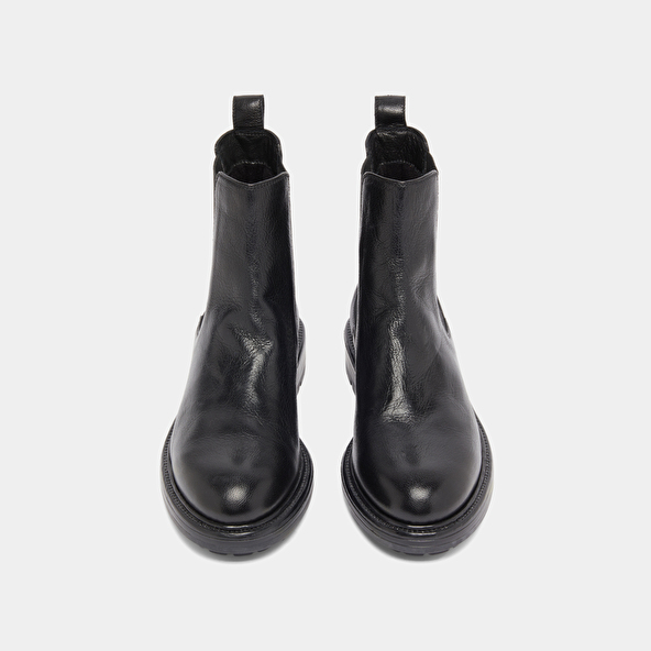 Lowboots with elastic straps and notched soles in black grained leather | CELINA