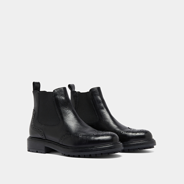 Boots à semelles crantées in black leather | CELIA