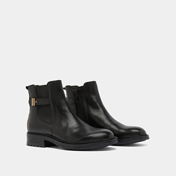 Boots basses à talons crantés in black leather | GABIN