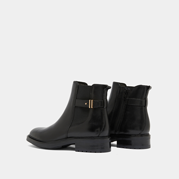 Boots basses à talons crantés in black leather | GABIN