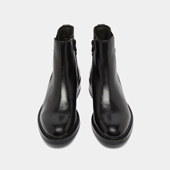Boots basses à talons crantés in black leather | GABIN