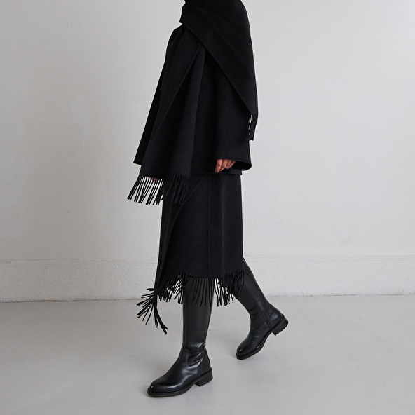 Bottes à talons crantés in black leather | GRACIANA