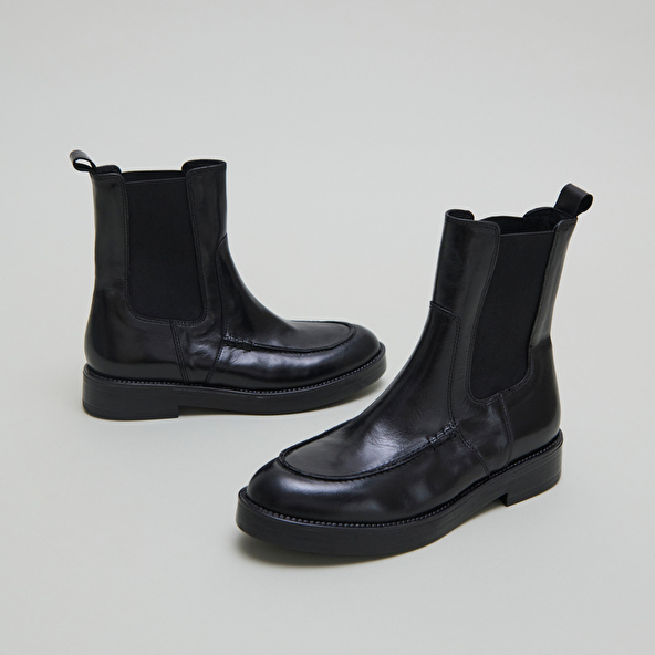 Boots à élastiques larges in black leather | ALLAN