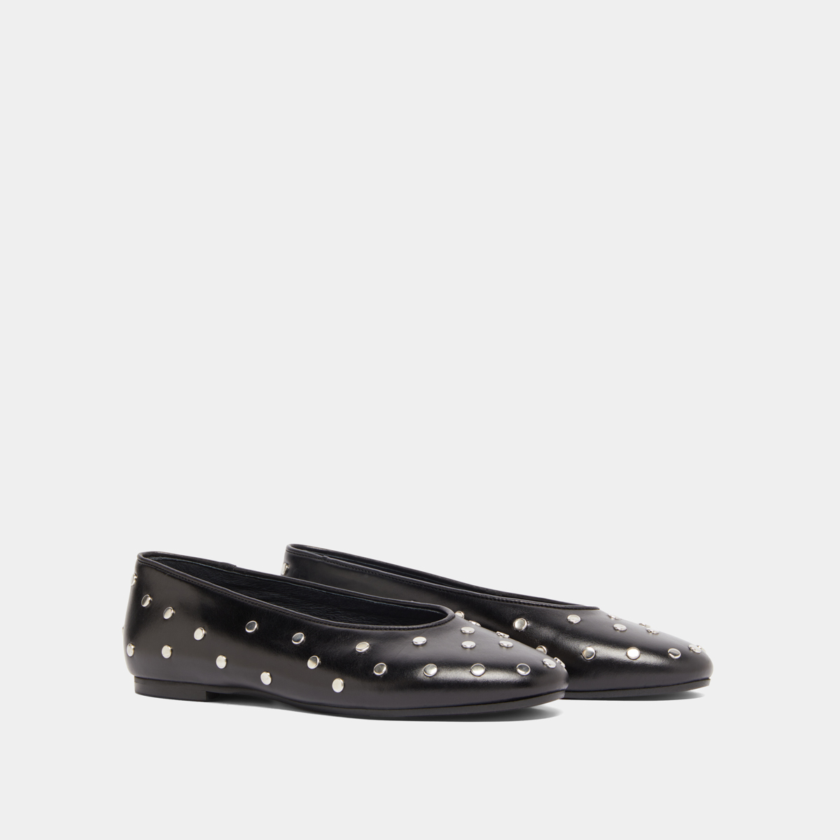 Ballet flats with silver details in black leather | DANIA