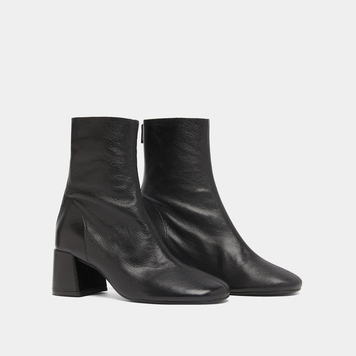 Bottines à fermetures éclairs arrières in black grained leather | DENONIE