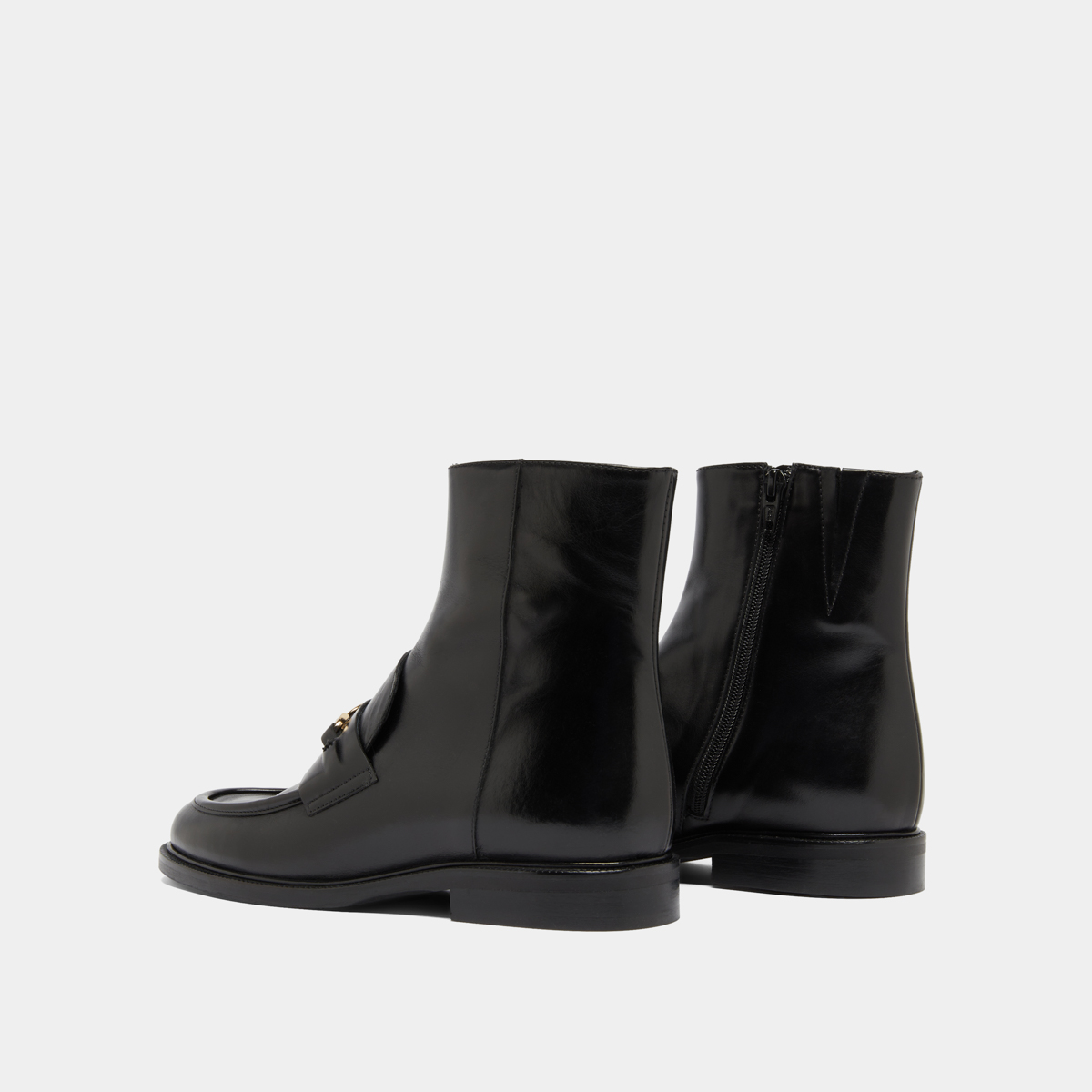 Boots à mors dorés in black leather | DIVOK