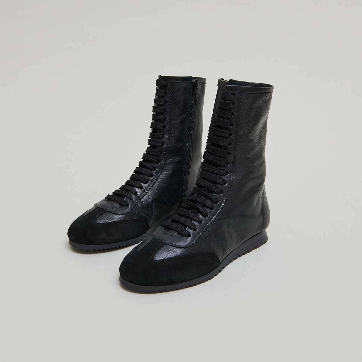 High lace-up sneakers in black suede and black leather | DOUBONE