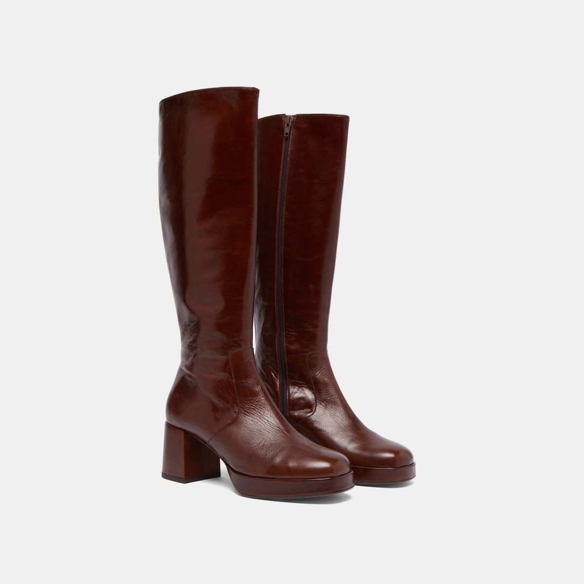 Heeled platform boots in brown distressed leather | VANEO