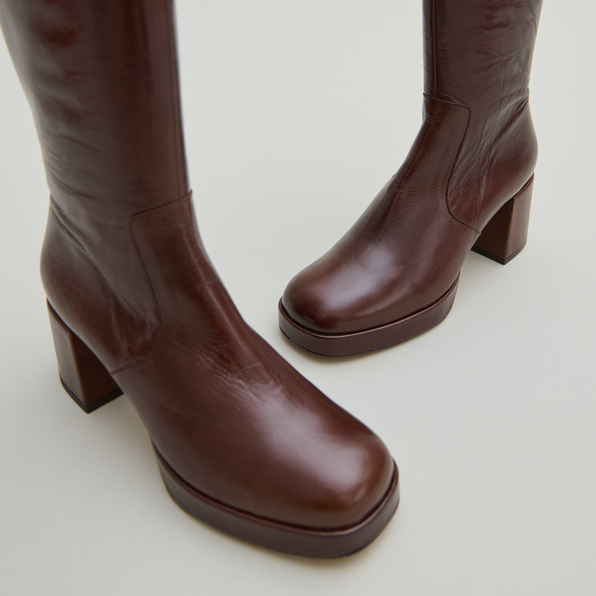 Heeled platform boots in brown distressed leather | VANEO