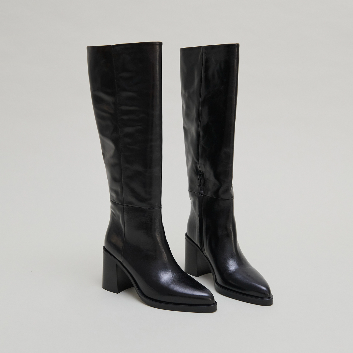 Boots with laminated heels in black leather | DICKINSON