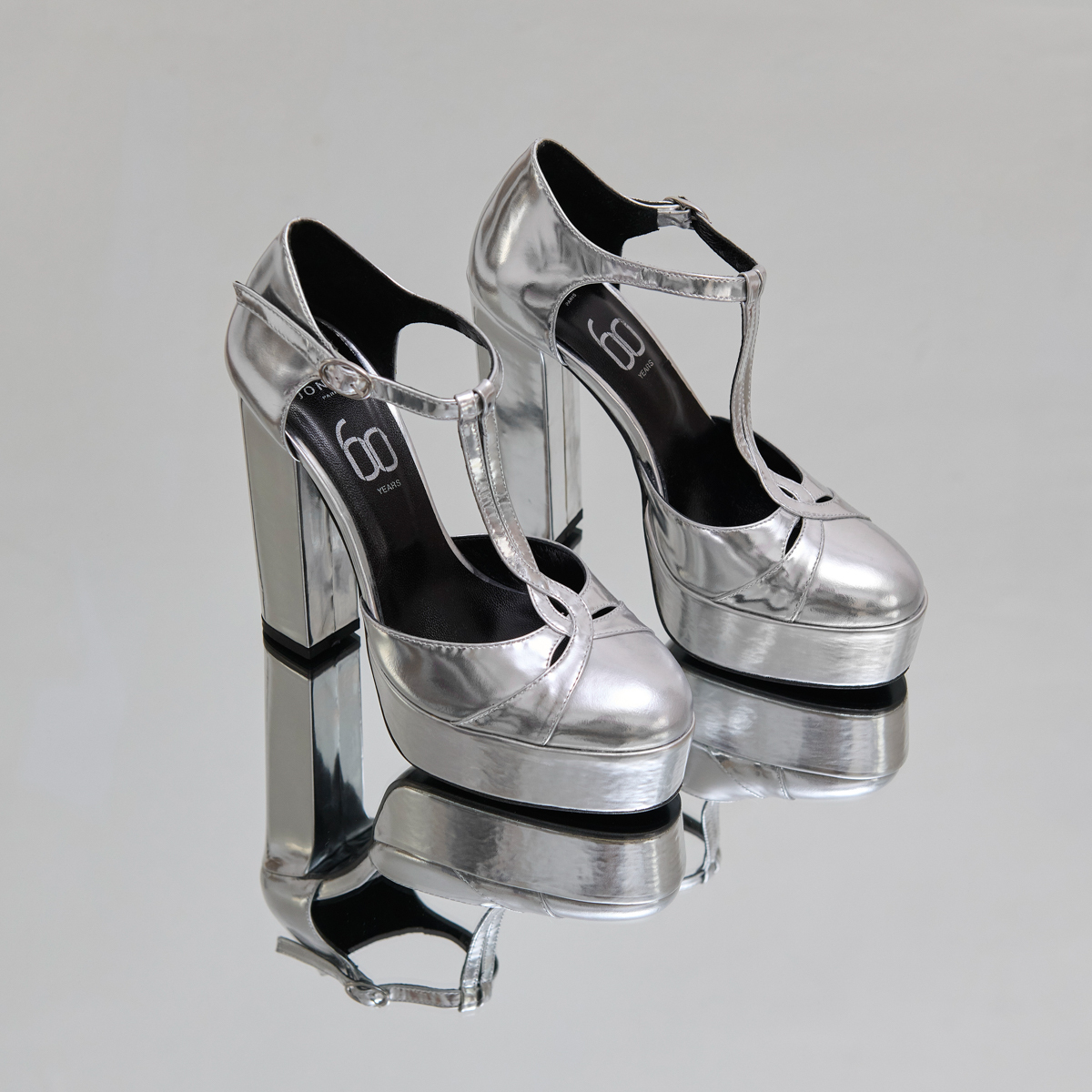 Salomés à talons et plateformes in silver metallic leather | REWIND