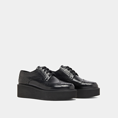 Derbies compens&eacute;es in black leather | adrielle