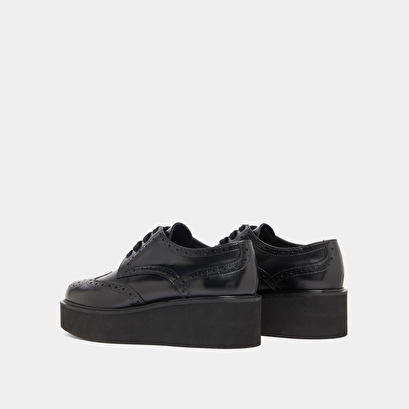 Derbies compens&eacute;es in black leather | adrielle