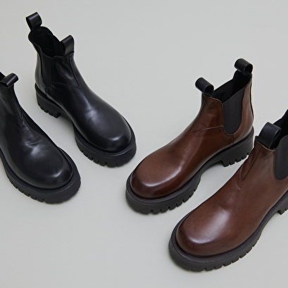 Boots &agrave; semelles crant&eacute;es in brown patinated leather | roche