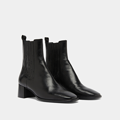 Bottines &agrave; fronces in black leather | dingo