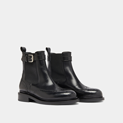 Boots &agrave; boucles in black leather | douby