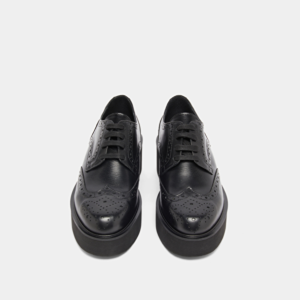 Derbies compensées in black leather | ADRIELLE