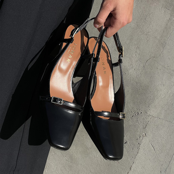 Heeled slingbacks in black glazed leather | DADELLE