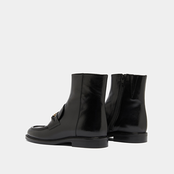 Boots à mors dorés in black leather | DIVOK