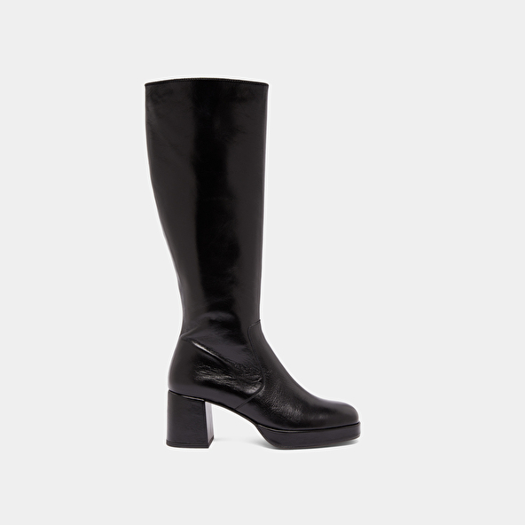Heeled platform boots in black distressed leather | VANEO