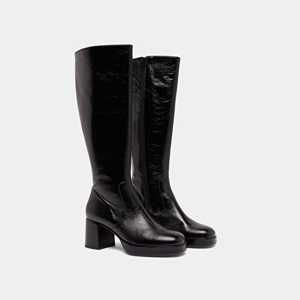 Heeled platform boots in black distressed leather | VANEO