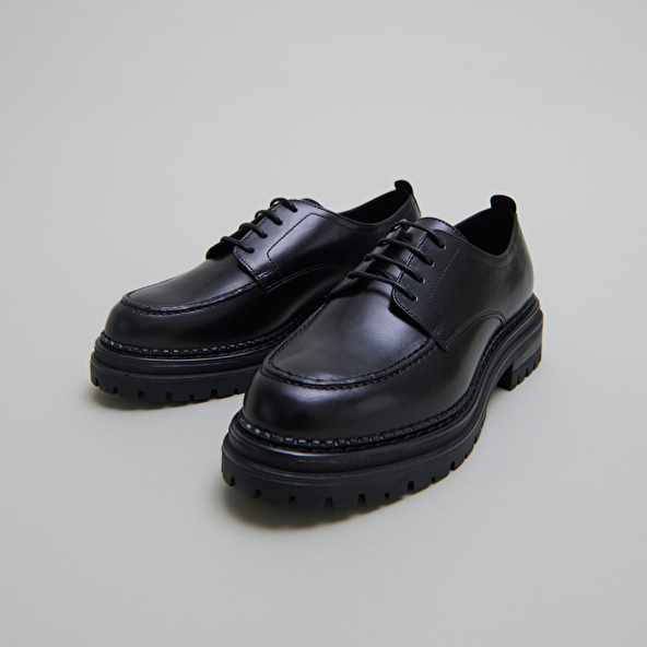 Derbies à semelles crantées in black leather | ADALOU