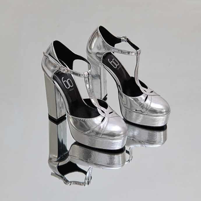 Salomés à talons et plateformes in silver metallic leather | REWIND