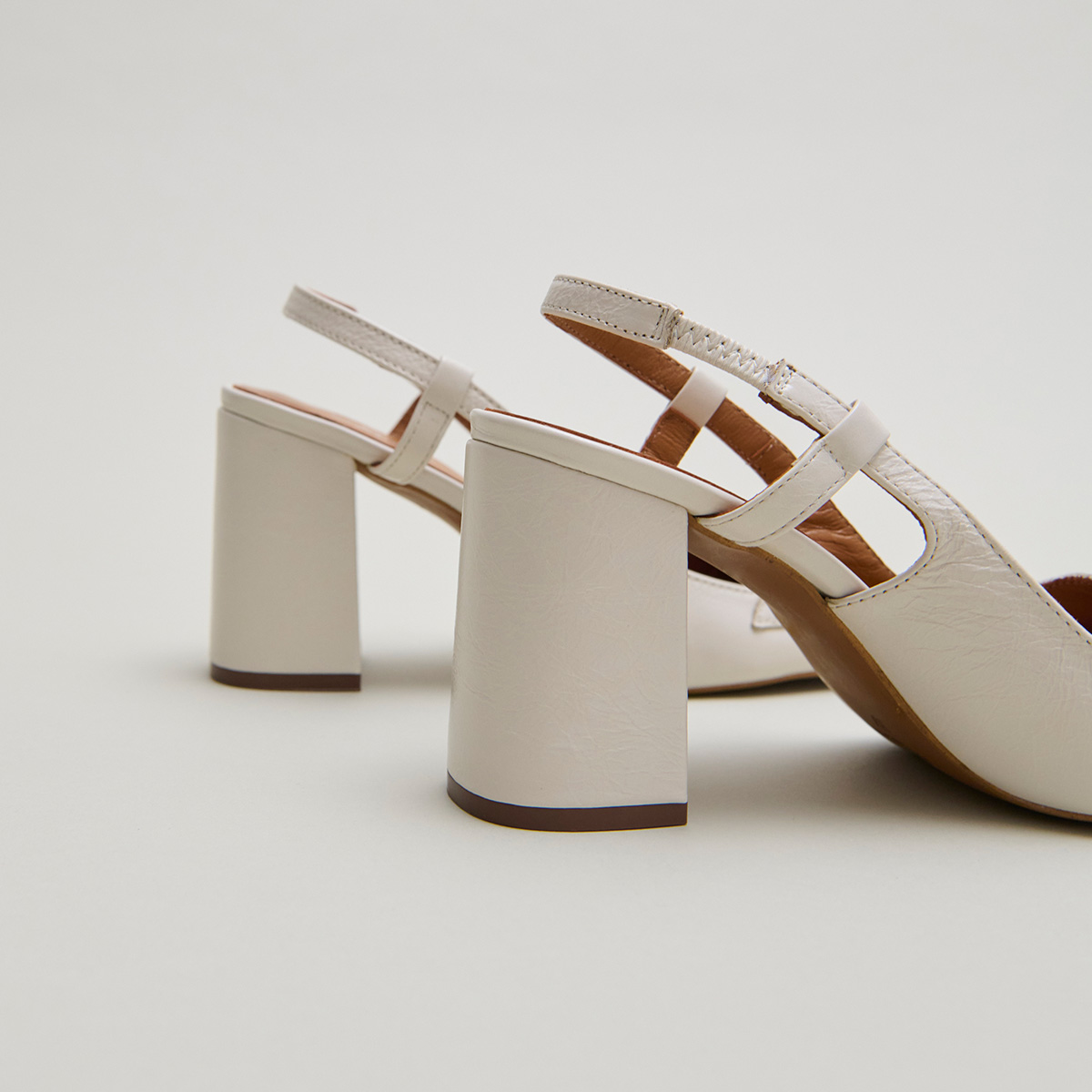 Slingbacks with gold bits in ecru distressed leather | BASEL