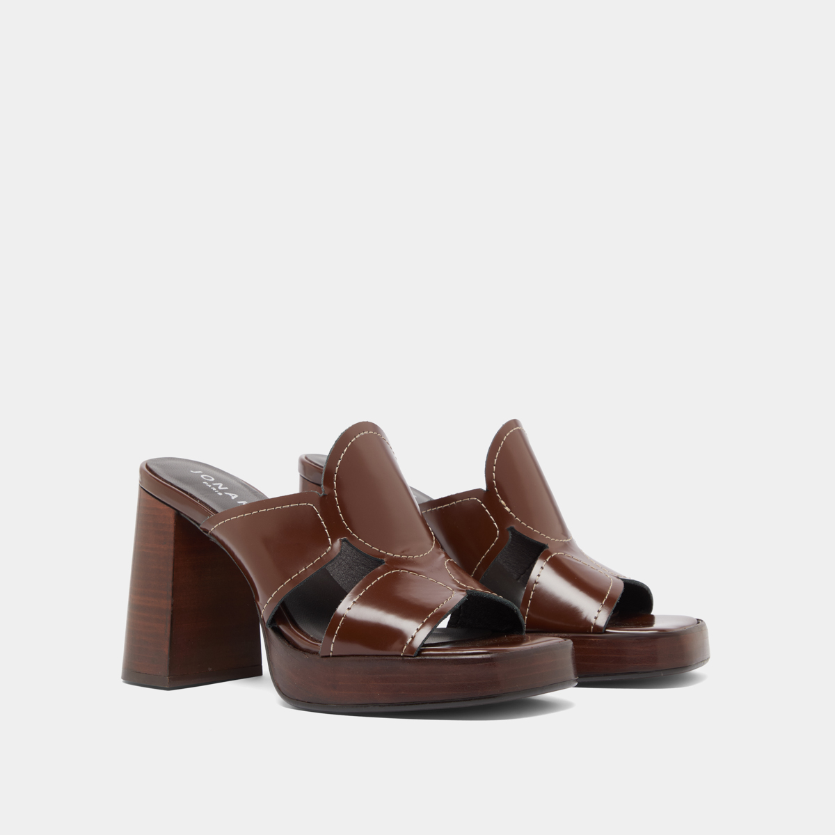Heeled mules in brown glazed leather | BELLE