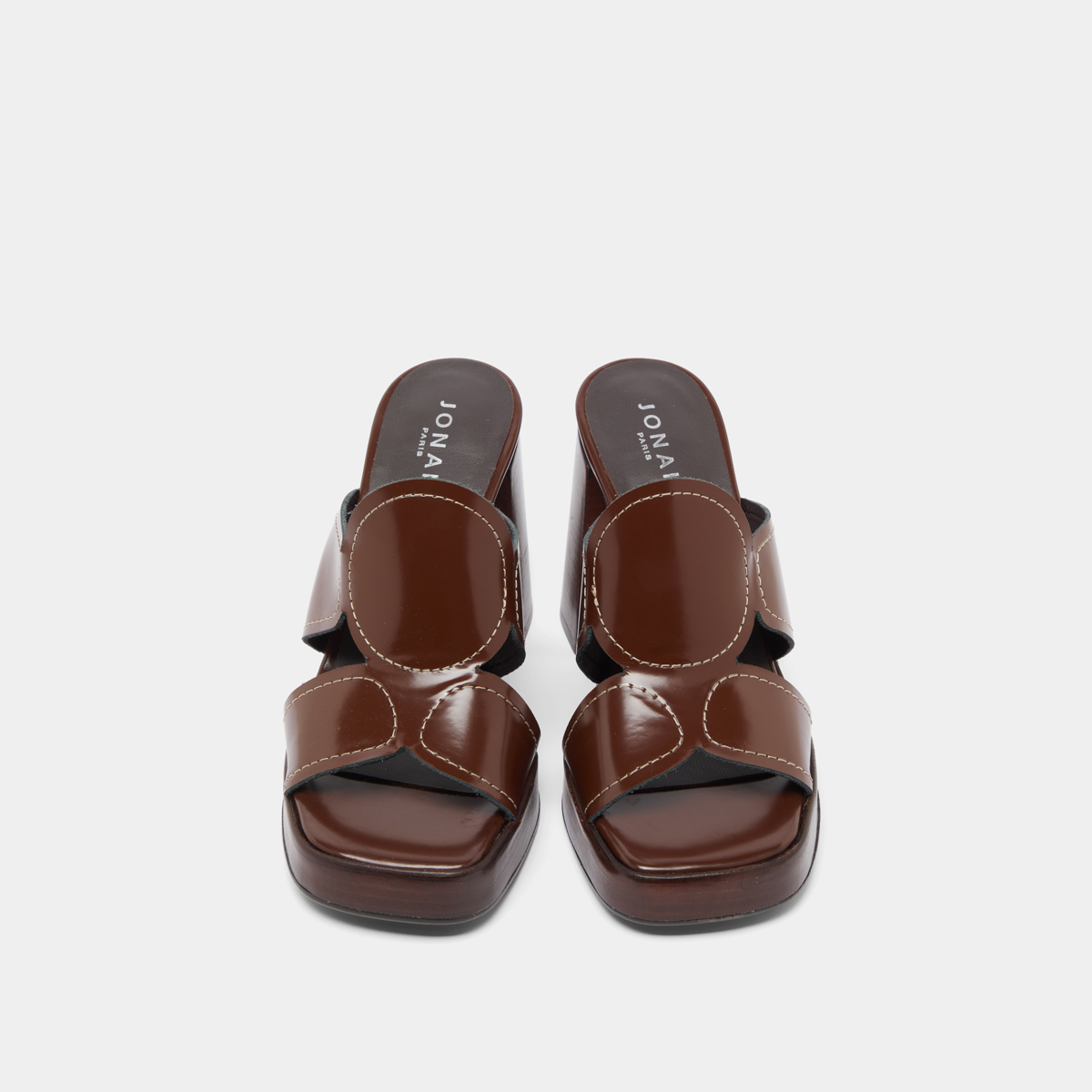 Heeled mules in brown glazed leather | BELLE