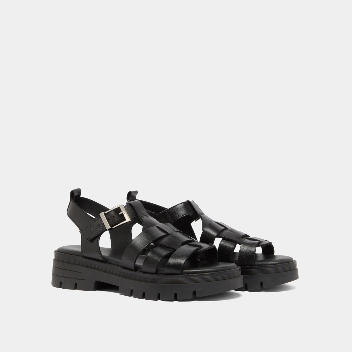 Sandals with notched soles in black leather | ANASTASIA