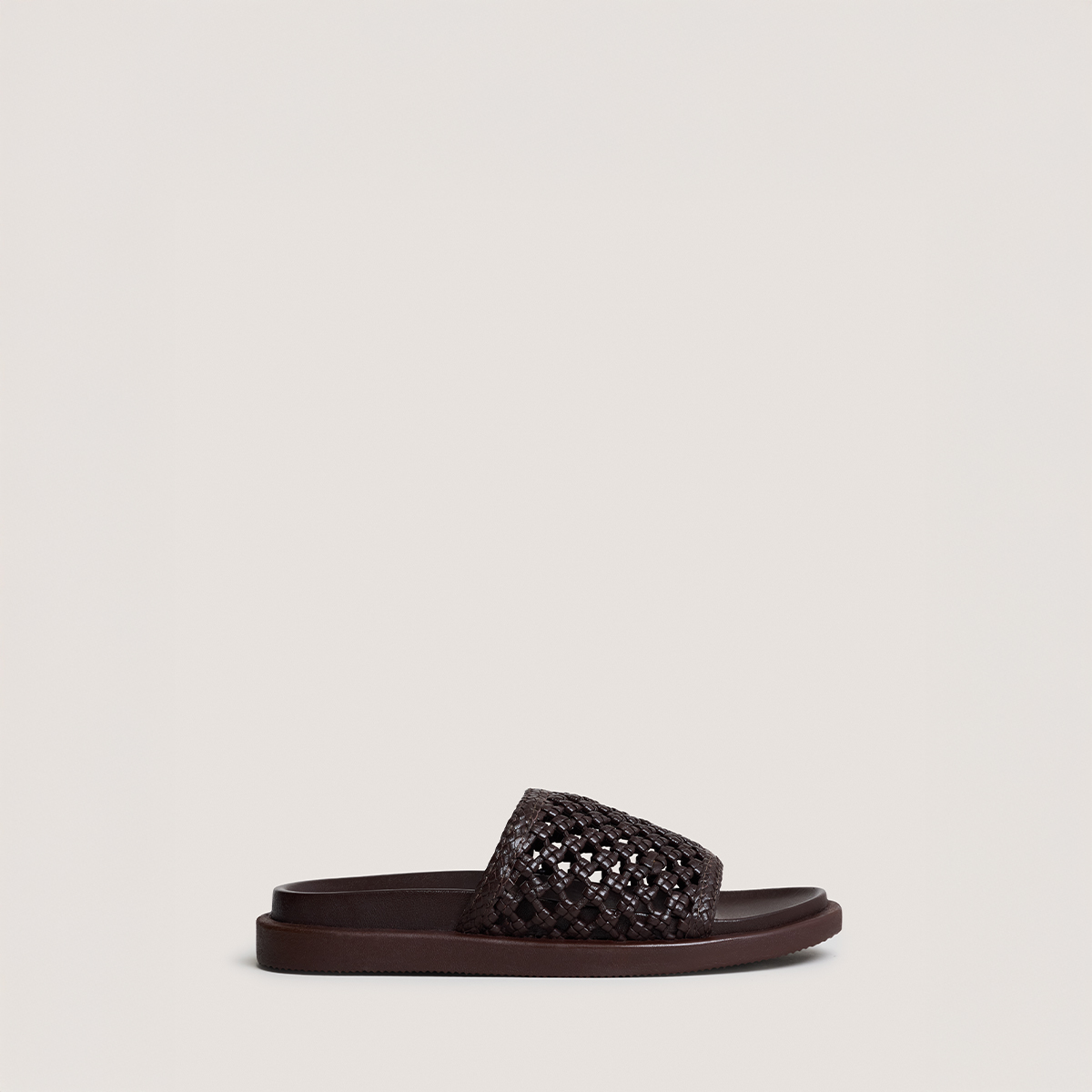 Openwork mules in dark brown leather | WOZART