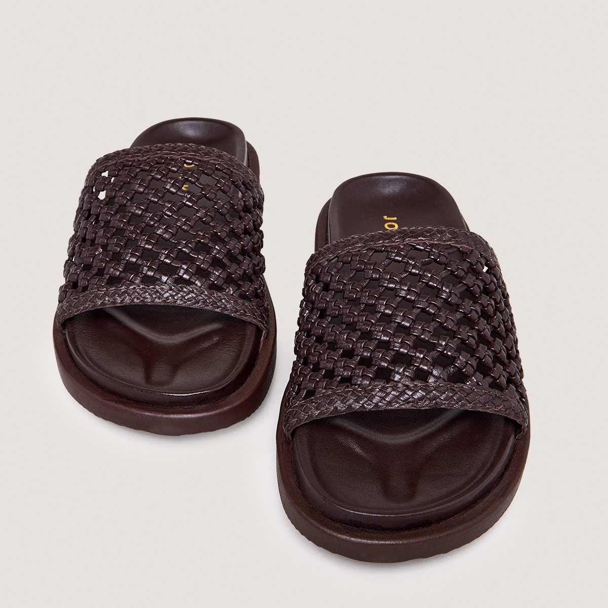 Openwork mules in dark brown leather | WOZART