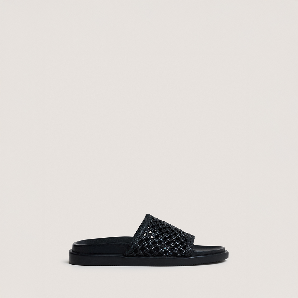 Openwork mules in black leather | WOZART