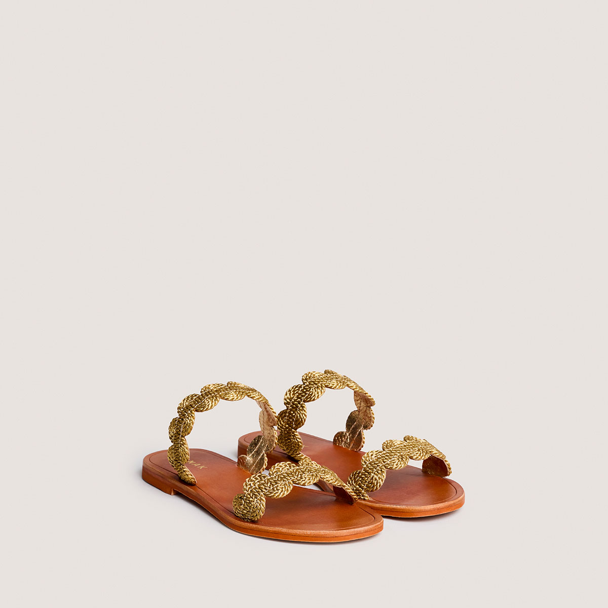 Plagettes with twisted straps in gold rope | WIDO