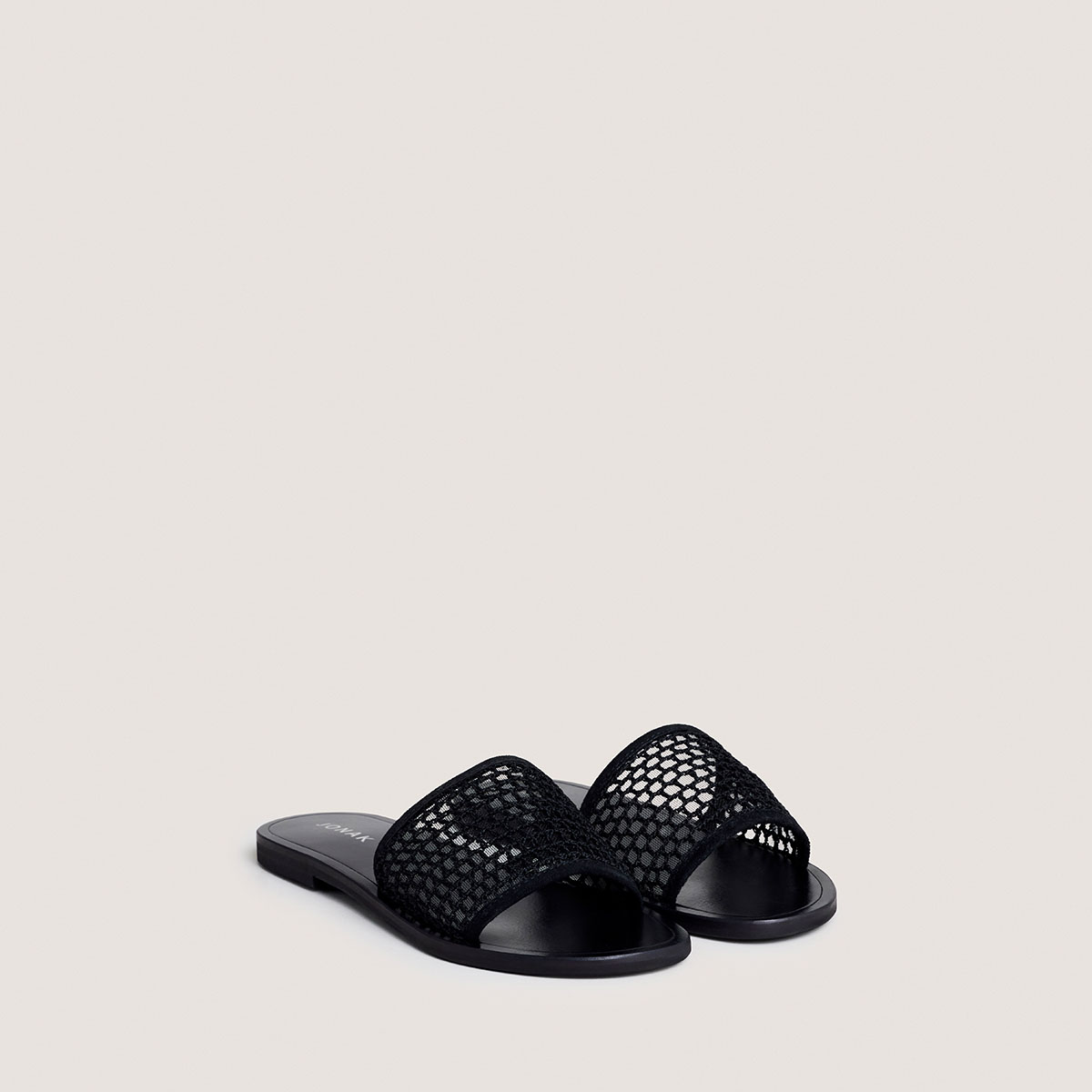 Plagettes with openwork details in black mesh and velvet | WAW