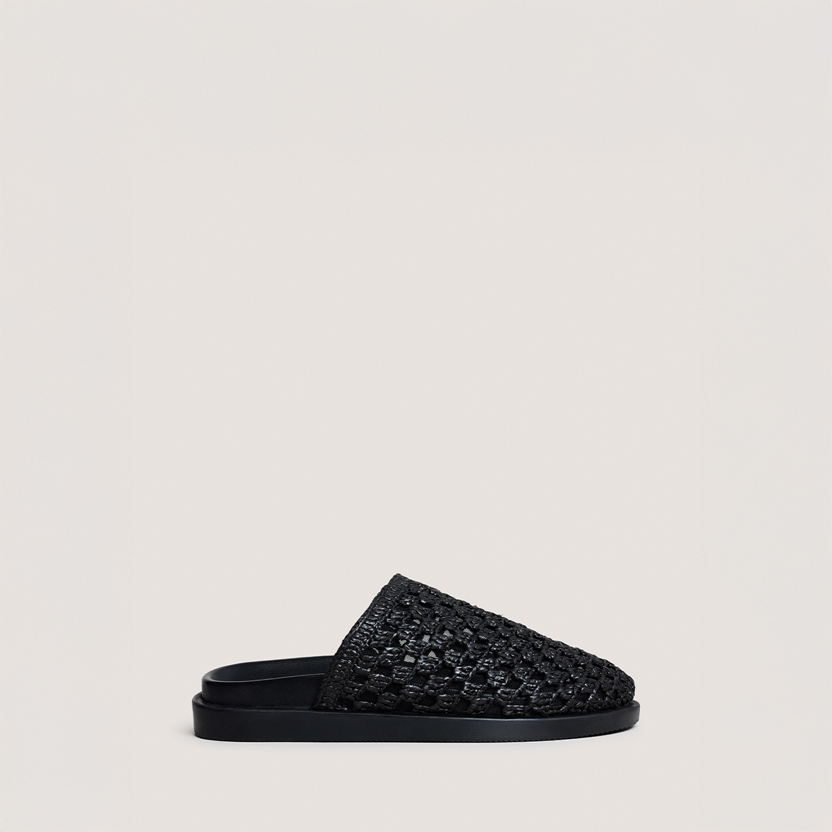 Openwork mules in black raffia | WOLFANG