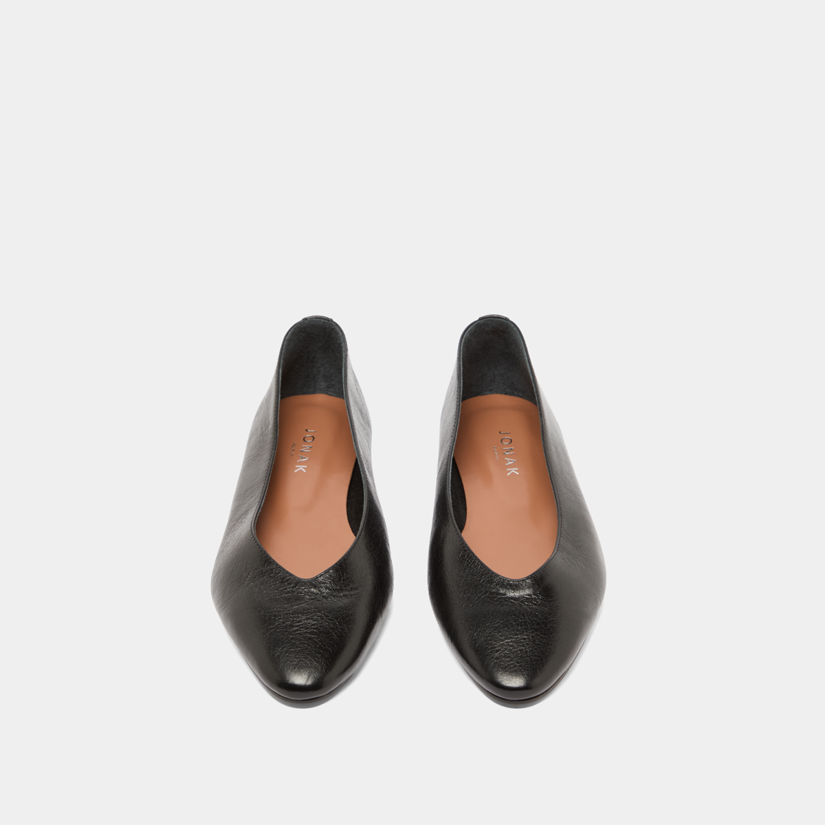 Pointed-toe ballet flats in black distressed leather | DASSUS