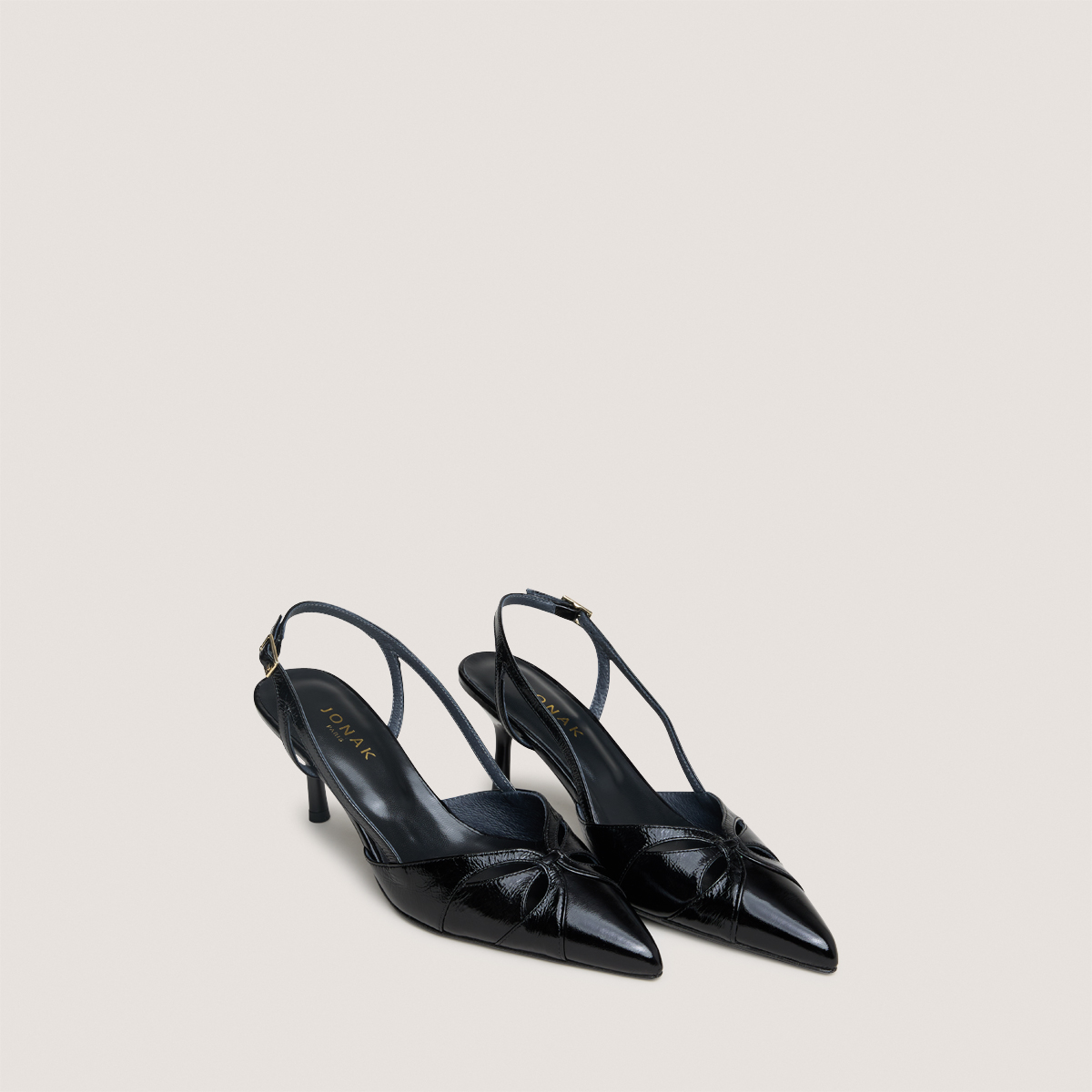 Slingback pumps with pointed toes in black shiny leather | DAMOUR