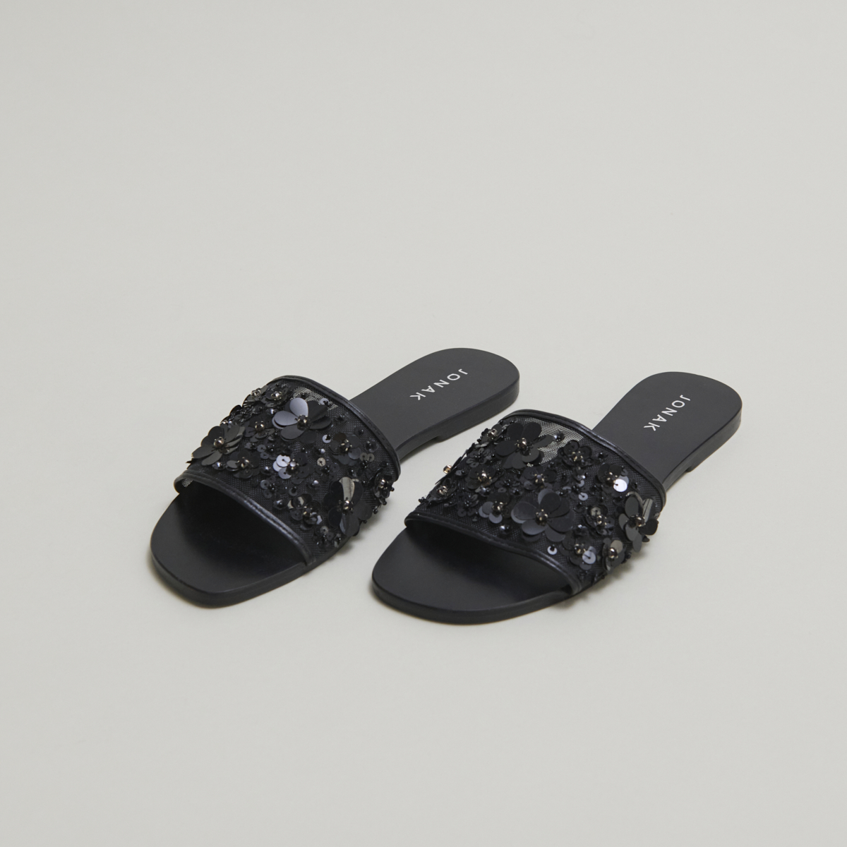 Beach sandals with flowers in black leather and black textile | SUN