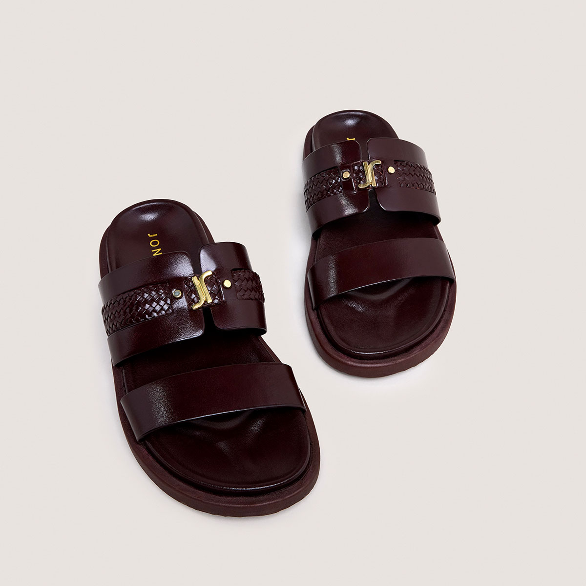 Monogrammed mules in dark brown leather | WAC