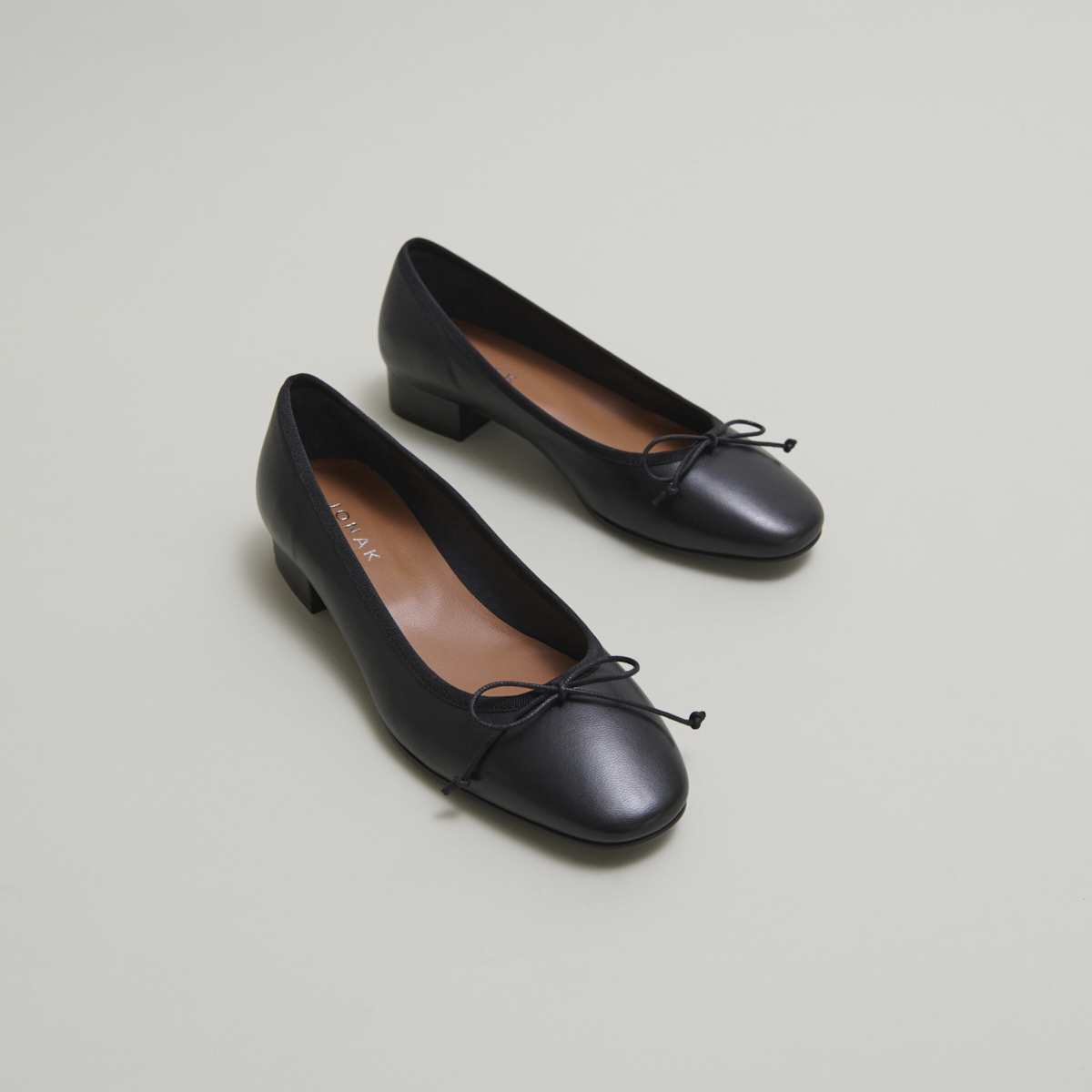 Heeled ballet flats in black leather | DADOU