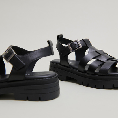 Sandals with notched soles in black leather | anastasia