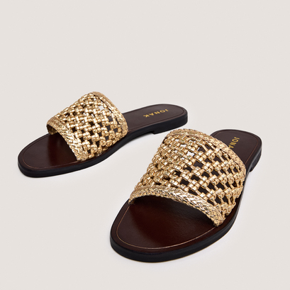 Openwork beach sandals in gold metallic leather | wissel