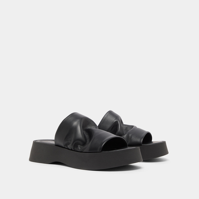 Platform mules in black leather | ERNEST