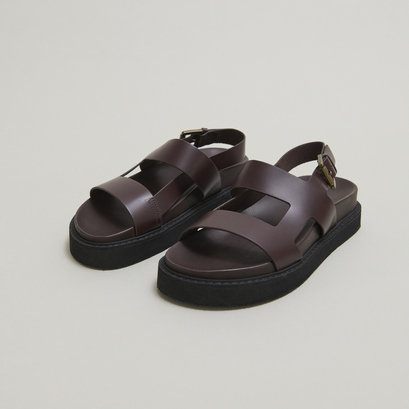 Cross-strap sandals in dark brown glazed leather | lagune