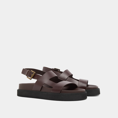 Cross-strap sandals in dark brown glazed leather | lagune