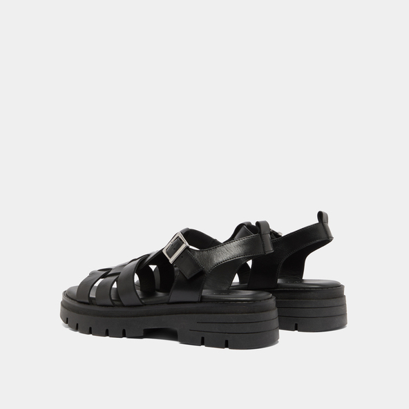 Sandals with notched soles in black leather | ANASTASIA