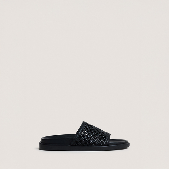 Openwork mules in black leather | WOZART